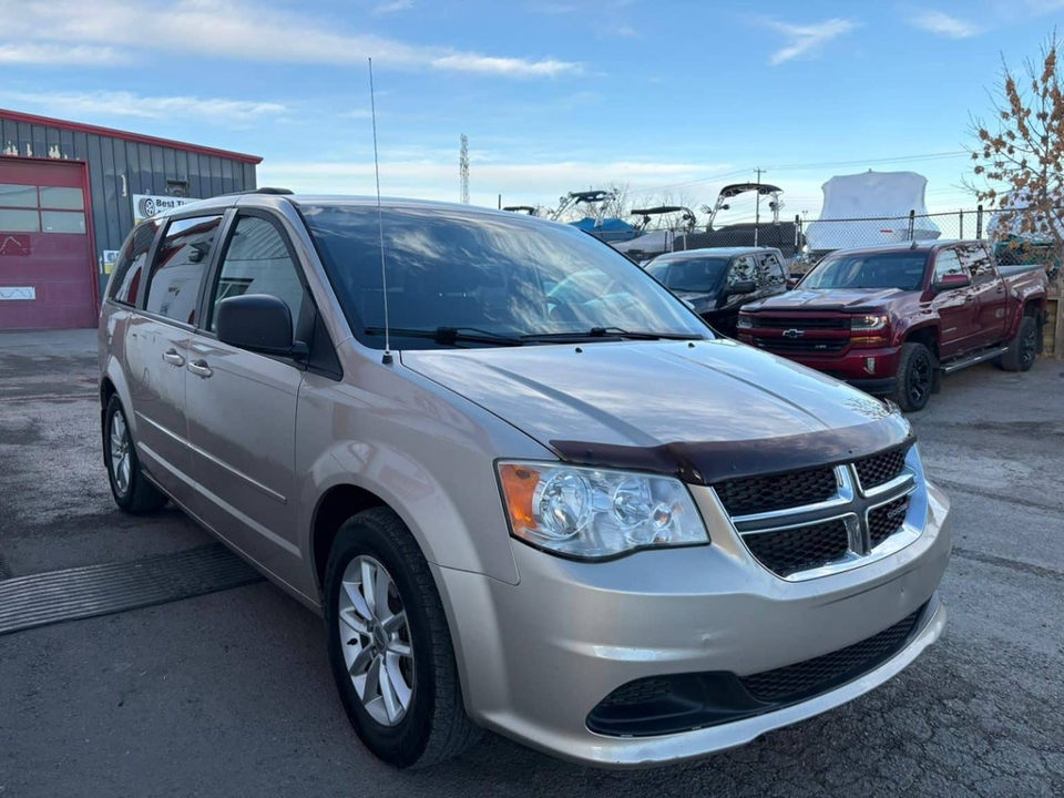 Original Dodge Grand Caravan photo taken outside a dealership